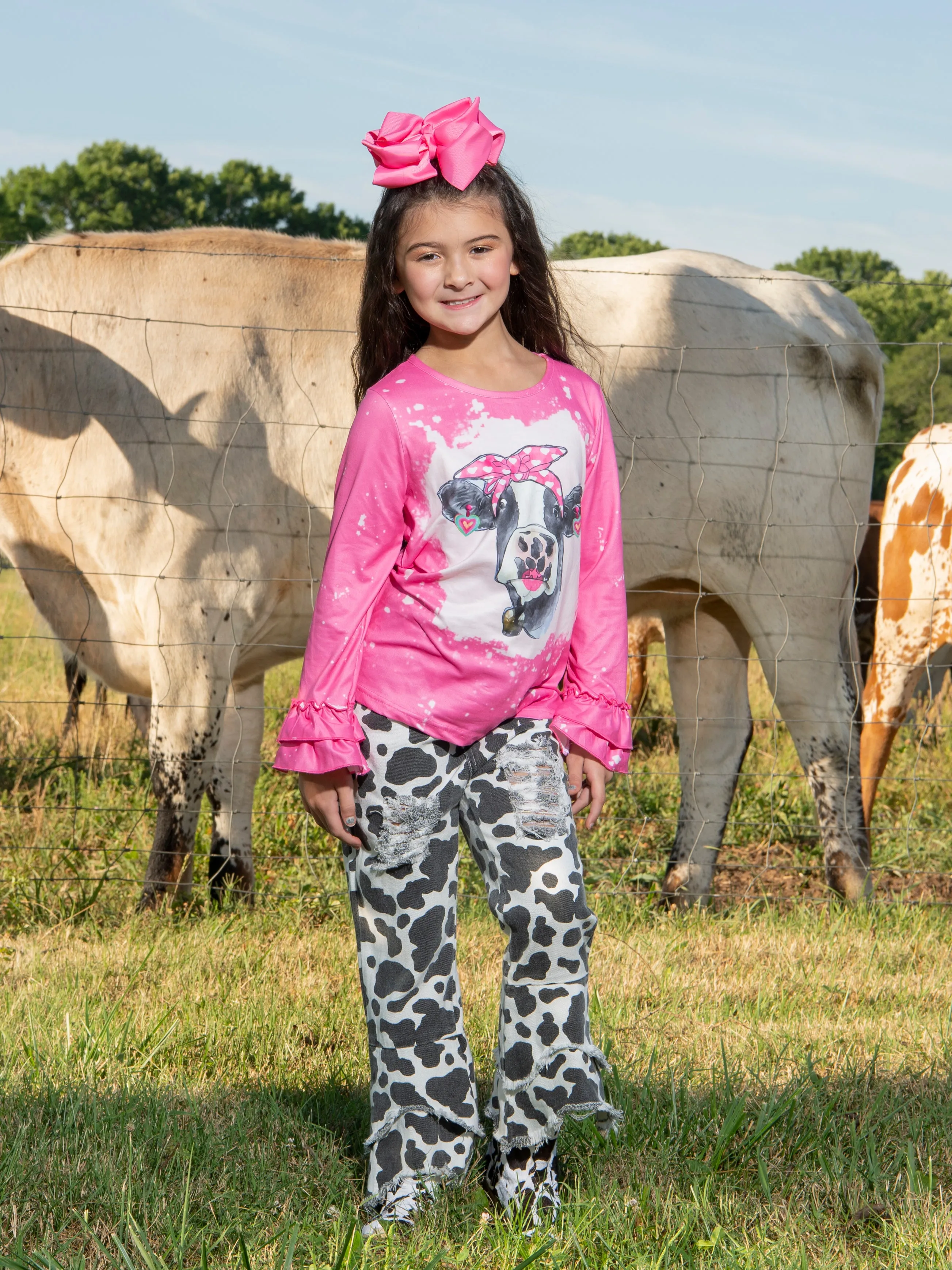 Pink Bleached Cow Top & Distressed Pants Outfit