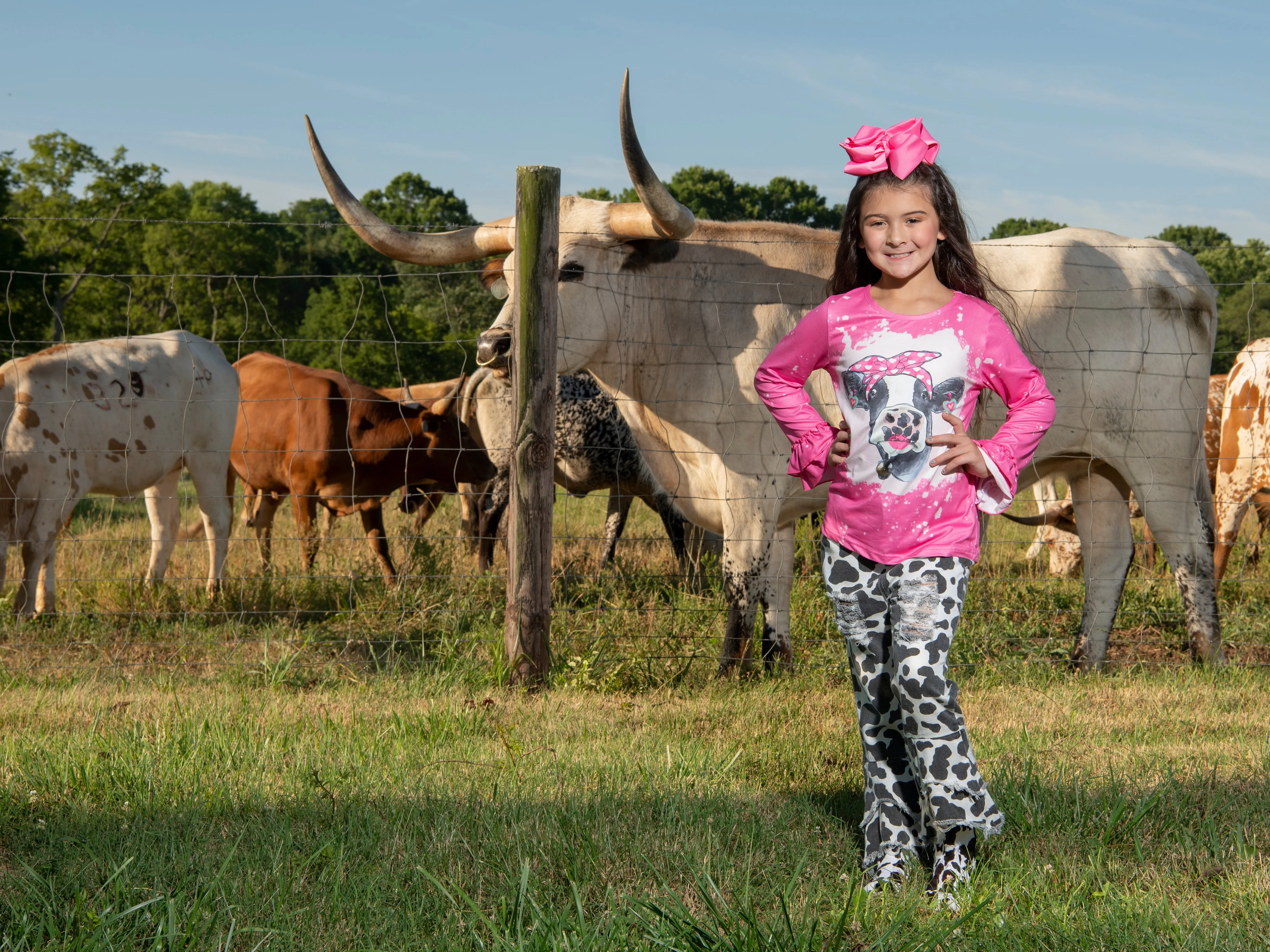 Pink Bleached Cow Top & Distressed Pants Outfit